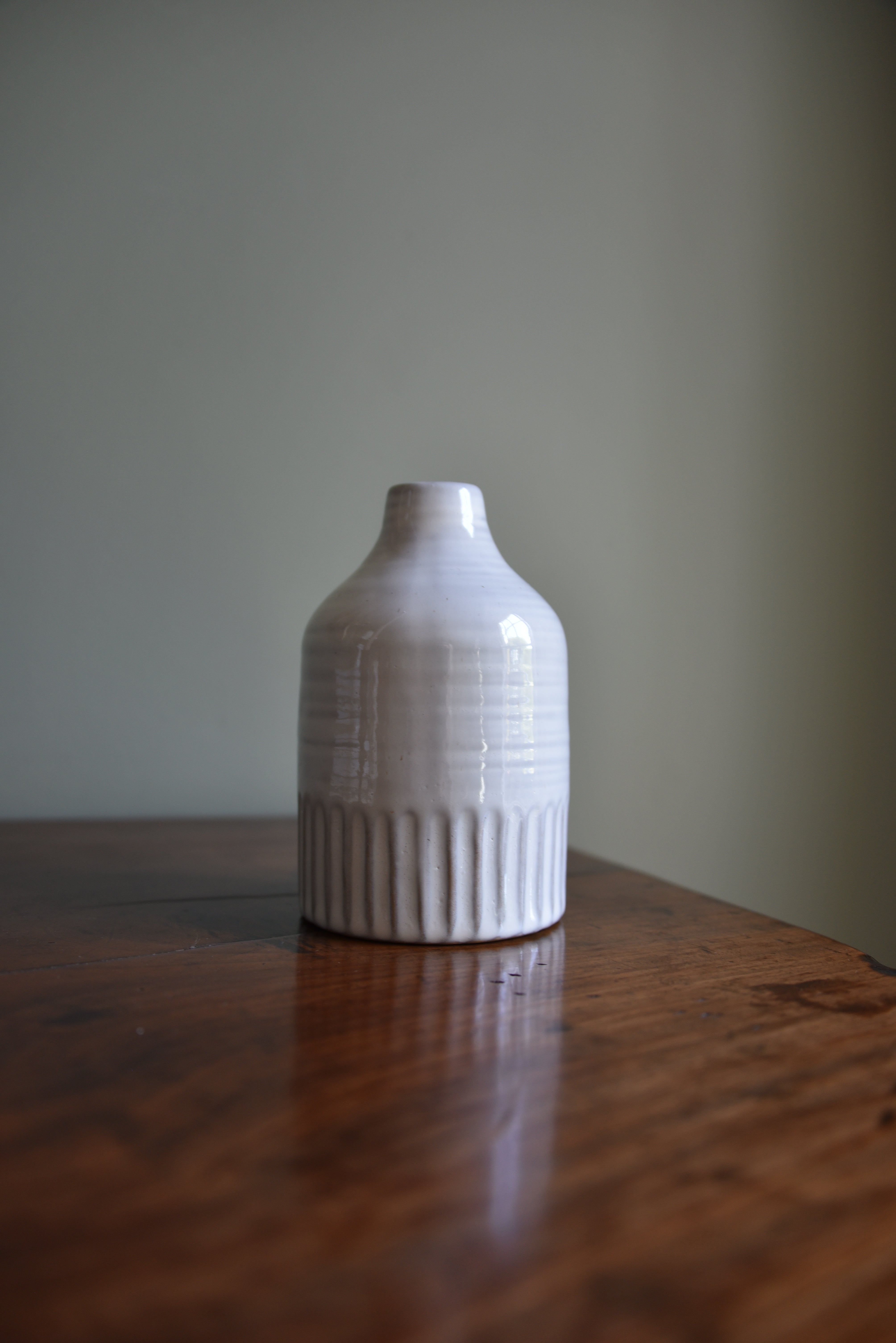 Embossed Milky White Bottle Vase