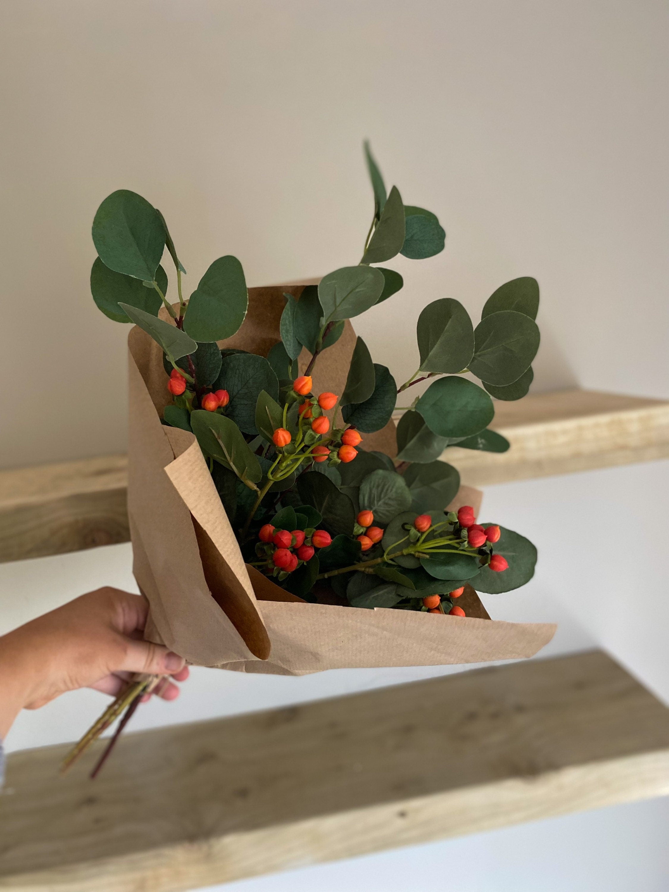 Red and Orange Hypericum Berries with Green Eucalyptus